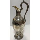 A Victorian engraved silver presentation claret jug inscribed "… To George M Cardew Captain and