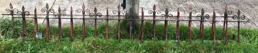 Two vintage cast metal wrought iron railing sections,