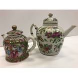 A 19th Century Chinese famille rose miniature teapot of inverted bell form,