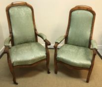 A 19th Century Continental stained beech high back upholstered open arm elbow chair on square