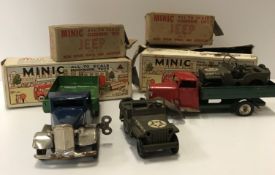 A collection of four Minic clockwork vehicles incuding Jeep No.