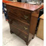A 19th Century mahogany chest, the plain top above three long graduated drawers on bracket feet,