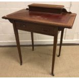 An Edwardian mahogany and satinwood banded ladies writing table in the Sheraton Revival taste,