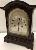 An early 20th Century mahogany cased mantel clock,