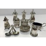 A modern silver three-piece cruet comprising lidded mustard with spoon,