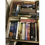 Twelve boxes of assorted books to include novels,