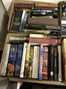 Twelve boxes of assorted books to include novels,