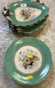 A Victorian ironstone dessert service, with underglazed transfer decoration and green banded border,