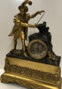 A 19th Century gilt brass cased figural mantel clock,