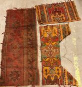 A collection of twelve various Ushak rug fragments in orange and green colour,