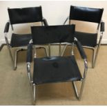 A set of four cantilever chrome framed dining chairs with faux black leather back panel,