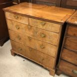 An 18th Century walnut chest,