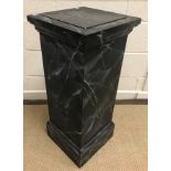 A 20th Century pedestal urn stand with black marble panel within a white veined faux black marble