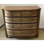 An early 19th Century figured mahogany and ebony strung bow fronted chest of two short over three