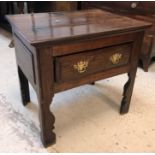 An oak side table in the 17th Century style,