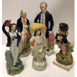 A collection of five various Staffordshire figures including Duke of Wellington 35 cm high,