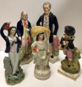 A collection of five various Staffordshire figures including Duke of Wellington 35 cm high,