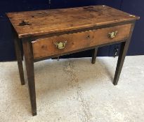 A late 18th Century Provincial oak single drawer side table on square tapered legs (formerly with