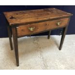 A late 18th Century Provincial oak single drawer side table on square tapered legs (formerly with