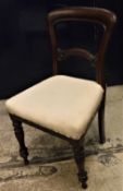 A set of eight Victorian mahogany bar back dining chairs on turned front legs