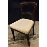 A set of eight Victorian mahogany bar back dining chairs on turned front legs