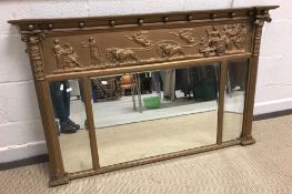 A 19th Century gilt framed overmantel mirror with Classical relief decoration to the top,