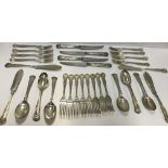 A modern silver canteen of Kings Pattern cutlery comprising eight forks, six dessert spoons,