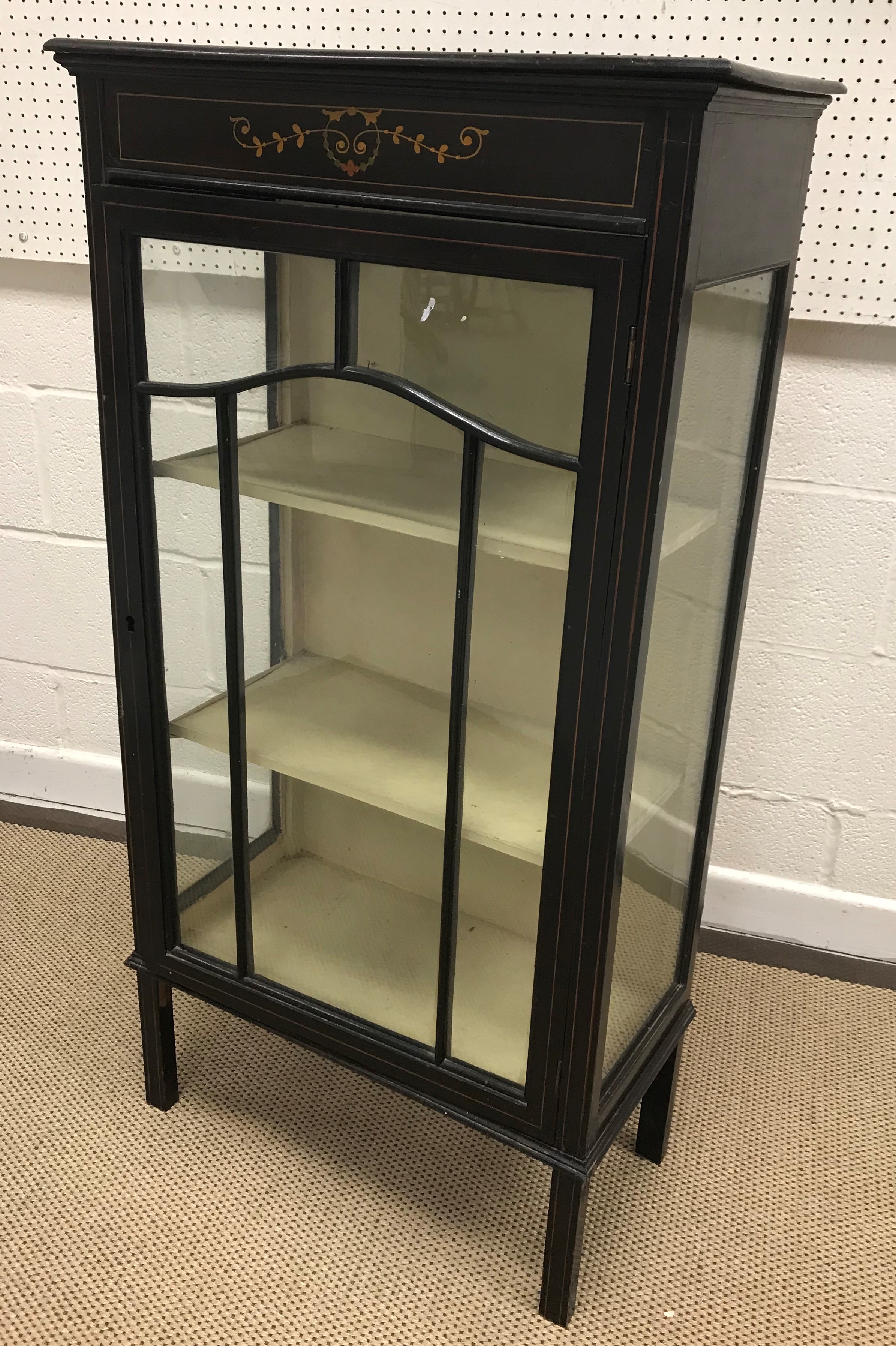 An Edwardian mahogany and satinwood strung single door display cabinet with...