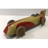 A Chad Valley clockwork tinplate racing car 30 cm long