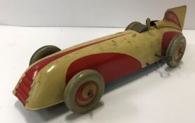 A Chad Valley clockwork tinplate racing car 30 cm long