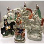 A collection of seven 19th Century Staffordshire figures on horseback including "Scotsman with stag