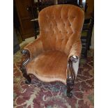 A Victorian mahogany show frame button back upholstered salon chair,