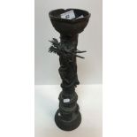 A 19th Century Chinese bronze candle holder,