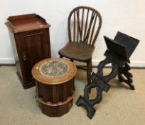 A mahogany pot cupboard, cylindrical commode stool, stick back chair, carved Koran stand,