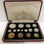A Morocco leather cased set of George VI specimen coins 1937, crown-one penny silver,