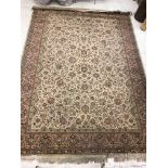 A machine made Persian rug,
