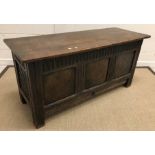 An oak coffer in the 17th Century manner,