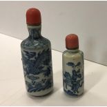 A Chinese blue and white pottery scent or snuff bottle of cylindrical form,