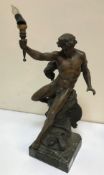 A 19th Century spelter table lamp in the form of a male nude on rocky outcrop holding aloft a torch,