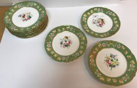 A set of twelve Victorian floral spray decorated dessert plates with green banded floral decorated