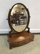 A 19th Century mahogany toilet mirror,