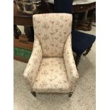 A Victorian upholstered prie a dieu chair on turned front legs to castors,