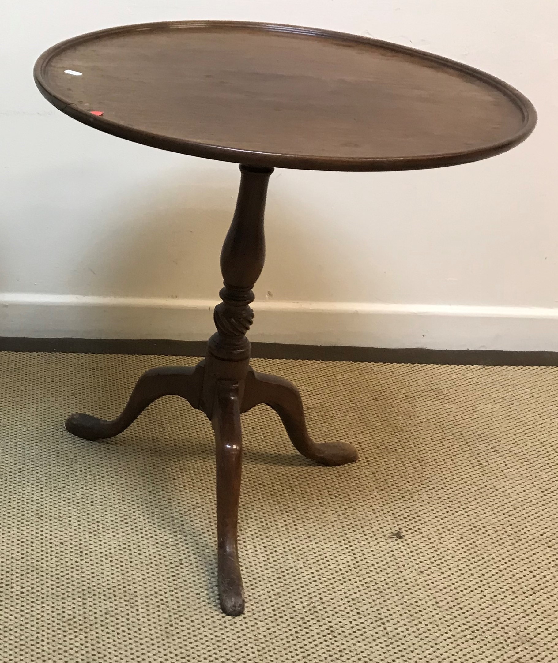 A circa 1800 oak tea table, the oval top on a birdcage to turned tapering pedestal and tripod base, - Image 3 of 5