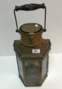 A circa 1900 brass hexagonal signalling lamp with swing handle to the top and signalling handle to