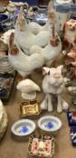 Two pairs of Chinese porcelain figures of Chickens, 35 cm and 30 cm high respectively,