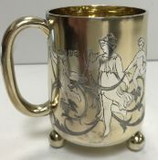 A Victorian silver gilt Christening mug inscribed "From LW Gibb to her nephew Charles March 1876"