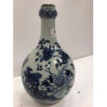 A 19th Century (or possibly earlier) Chinese blue and white bottle vase with collared neck