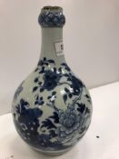A 19th Century (or possibly earlier) Chinese blue and white bottle vase with collared neck