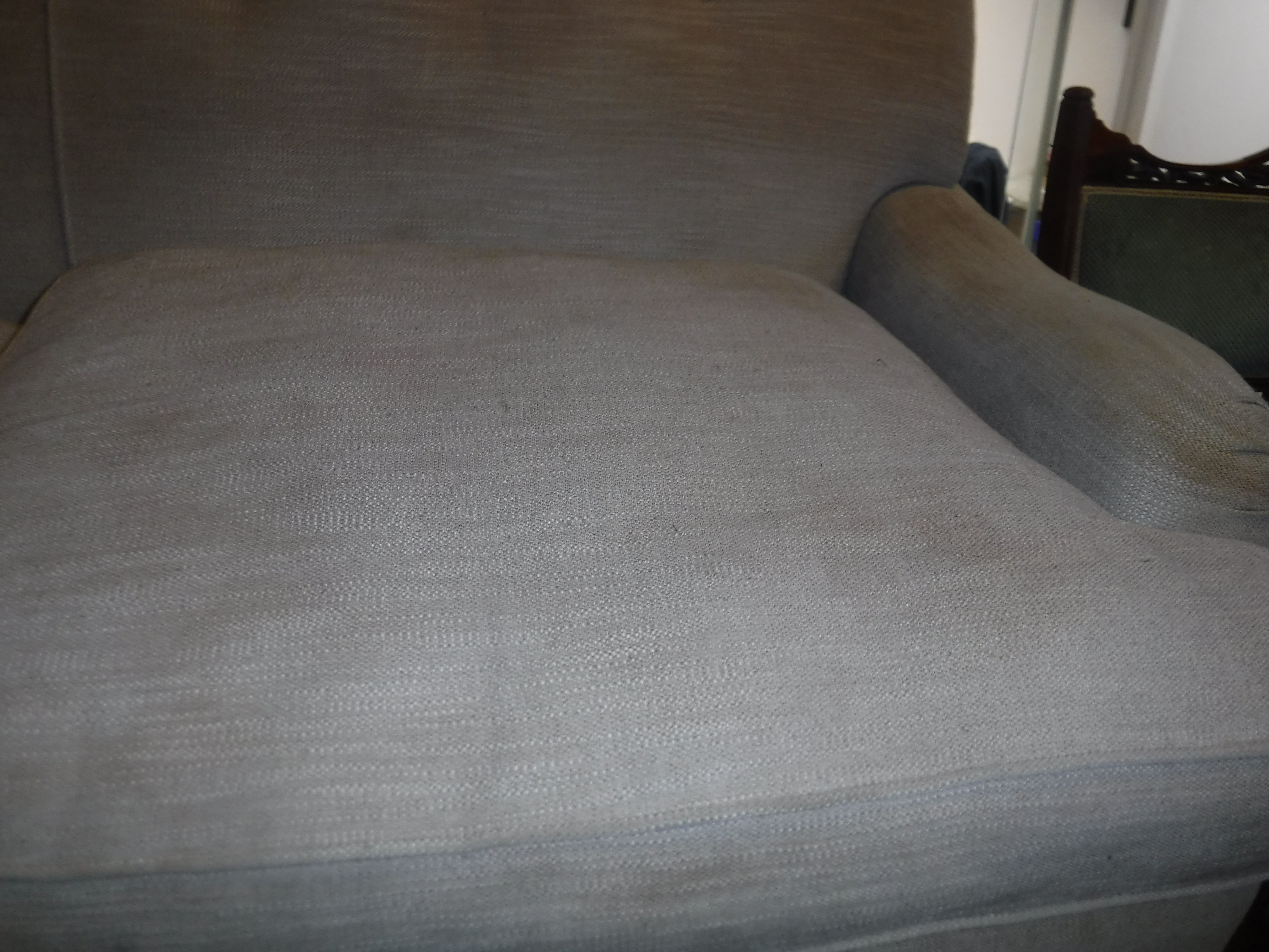 A modern mushroom or taupe upholstered two seat sofa in the Howard manner, - Image 8 of 10