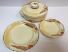 A Clarice Cliff "Bizarre" dinner service "Orange Capri" pattern, comprising two vegetable tureens,